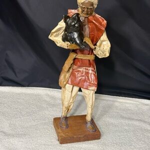 Artistic Sculpture with Red and Black Details